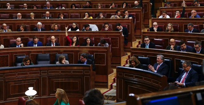 Momento de una de las votaciones durante el pleno del Congreso de los Diputados. EFE/J.P. Gandul