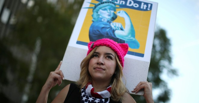 Kat Bembi, 35, participates in the International Women's Day 'Day Without a Women' anti-Trump protest in Los Angeles, California, U.S., March 8, 2017. REUTERS/Lucy Nicholson