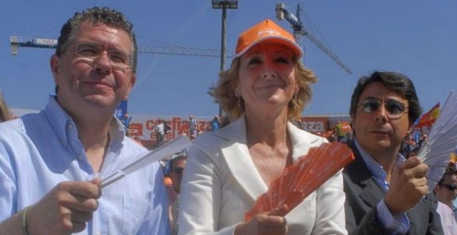 Francisco Granados e Ignacio González, ambos actualmente en prisión, junto a Esperanza Aguirre en un acto del Partido Popular en Madrid.