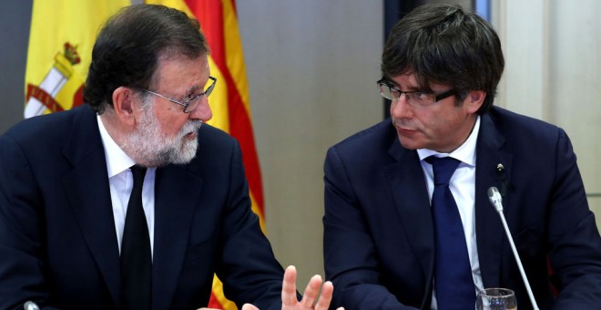 El presidente del Gobierno, Mariano Rajoy, y el presidente de la Generalitat de Cataluña, Carles Puigdemont / EFE