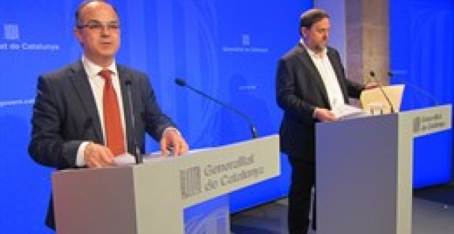 El conseller Jordi Turull i el vicepresident Oriol Junqueras en roda de premsa després de la reunió del Govern