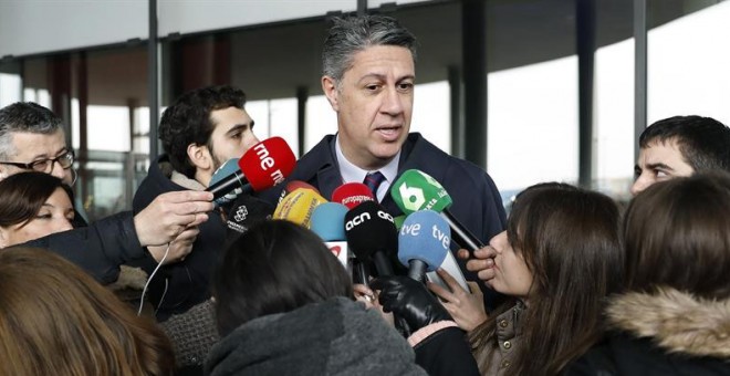 El president del PP català, Xavier García Albiol, en declaracions a la premsa abans de visitar el MWC. EFE / Andreu Dalmau