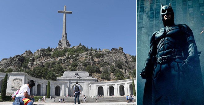La cruz del Valle de los Caídos y el Batman de Christopher Nolan. / J.J.GUILLÉN (EFE)