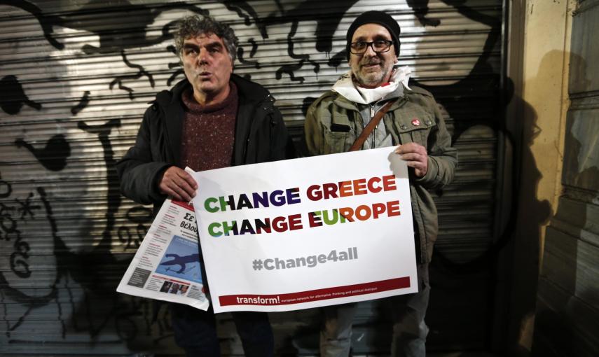 Simpatizantes de Syriza, con pancartas con el lema electoral de la formación, en el mitin de cierre de campaña en Atenas. REUTERS/Yannis Behrakis