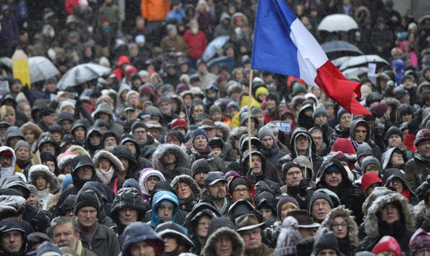 People attend a demonstration for peace and respect in Stockholm January 11, 2015. The rally is organised by Reporters without Borders and Swedish cartoonists in tribute to the 17 victims of the three-day Islamist killings in Paris, which started at the o