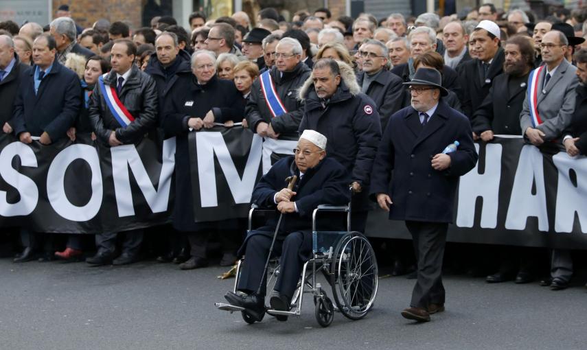 Paris Mosque rector Dalil Boubakeur (C), French political, religious and personalites take part in a solidarity march (Marche Republicaine) in the streets of Paris January 11, 2015. Hundreds of thousands of French citizens will be joined by dozens of fore