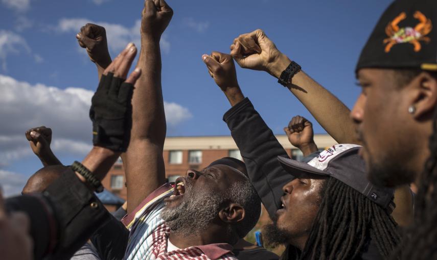 Men shout "Freddie G" as they protest against the death of 25-year-old black man Freddie Gray who died in police custody in Baltimore. REUTERS/Adrees Latif