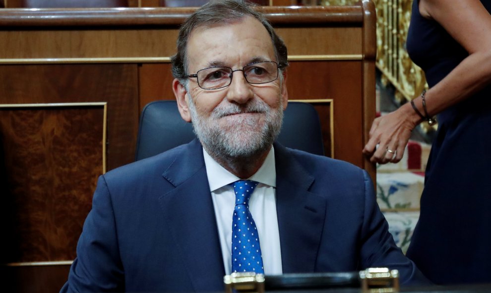 El presidente del Gobierno en funciones, Mariano Rajoy, tras su llegada al Congreso de los Diputados para la sesión de investidura. REUTERS/Juan Medina
