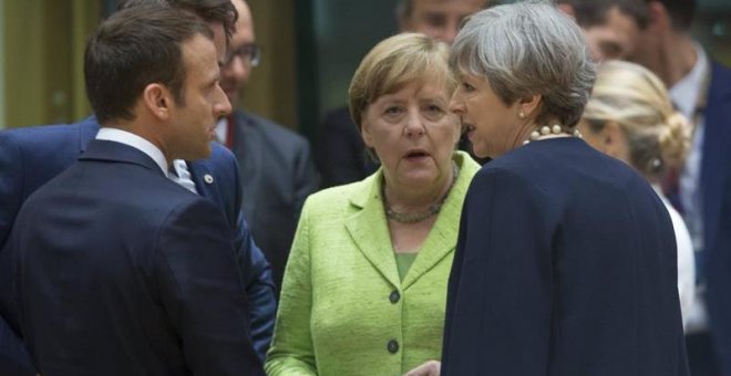 Macron, Merkel y May, hoy en Bruselas. EFE/Olivier Hoslet