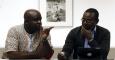 El presidente de la Conferencia Panafricana de España, Abuy Nfube, y el redactor del diario 'Afro Kairos', Simon Nong, durante la presentación del documento en Madrid. - EFE