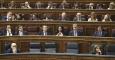 La vicepresidenta del Gobierno, Soraya Sáenz de Santamaría (d), durante el pleno del Congreso de los Diputados, el día después del debate del estado de la nación. / PACO CAMPOS (EFE)