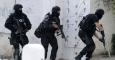 Miembros de la brigada antiterrorista tunecina toman posiciones en el barrio de Boucgucha. - REUTERS