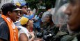 Opposition supporters shout to Venezuelan National Guards during clashes in a rally to demand a referendum to remove President Nicolas Maduro in Caracas, Venezuela, May 18, 2016. REUTERS/Carlos Garcia Rawlins