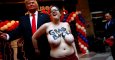 La activista del grupo feminista Femen, con el pecho descubierto, que ha protagonizado una protesta, en Madrid, ante la figura en cera de Donald Trump, presidente electo de EEUU. REUTERS/Susana Vera