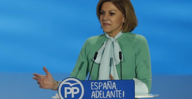 La secretaria general del PP, María Dolores de Cospedal, presenta el informe de gestión durante el el XVIII Congreso nacional del partido que se ha inaugurado esta tarde en la Caja Mágica de Madrid. EFE/Javier Lizón