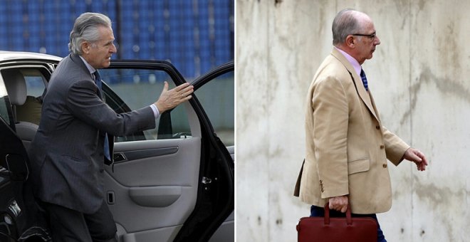 El expresidente de Caja Madrid, Miguel Blesa (i), y su sucesor y luego presidente de Bankia, Rodrigo Rato (d), a su llegada a las sesiones del juicio por las tarjetas black. EFE