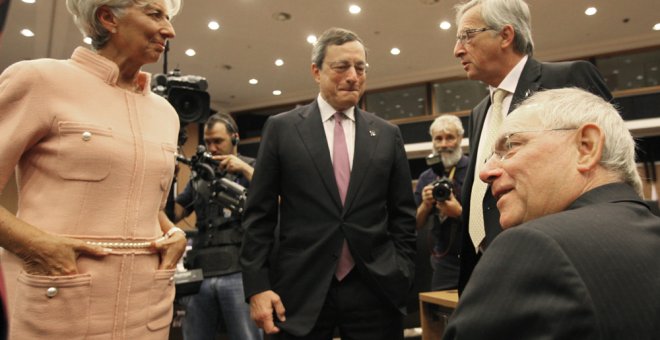 Christine Lagarde, Mario Draghi y Jean-Claude Juncker en una reunión informal del Eurogrupo en Nicosia (Chipre). AFP/ Yiannis Kourtoglou