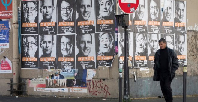 Fotografías de los candidatos presidenciales franceses en París. - AFP