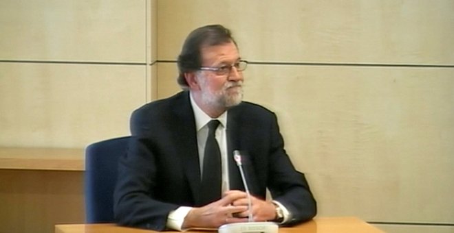 Rajoy durante su comparecencia como testigo por la trama Gürtel en la Audiencia Nacional.- REUTERS