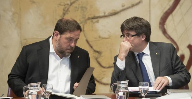 Oriol Junqueras y Carles Puigdemont. / MARTA PÉREZ (EFE)