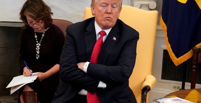 Trump, durante un encuentro con la prensa en el despacho oval de la Casa Blanca. | YURI GRIPAS (REUTERS)