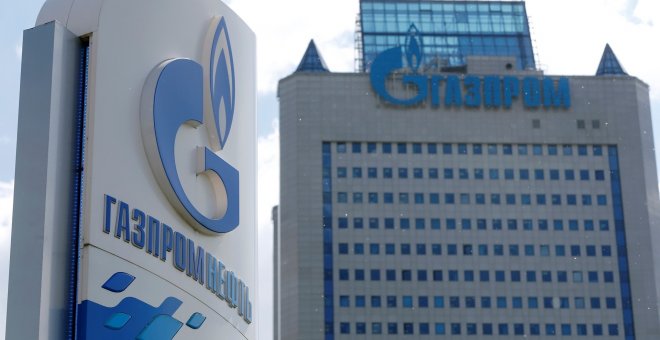 A board with the logo of Gazprom Neft oil company is seen at a fuel station in Moscow, Russia, May 30, 2016. REUTERS/Maxim Zmeyev