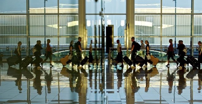 Pasajeros en el Aeropuerto Adolfo Suárez Barajas. E.P.