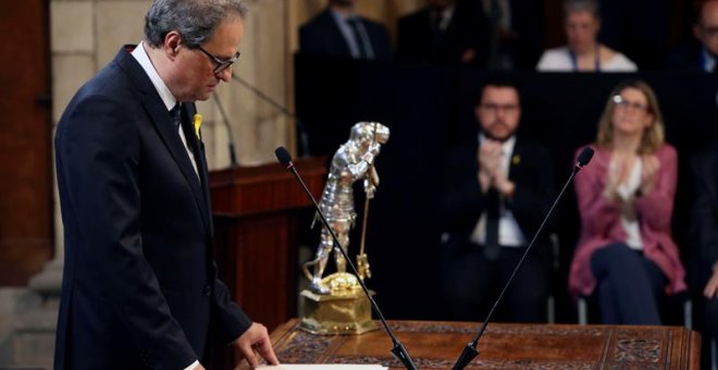 El presidente de la Generalitat, Quim Torra, durante su discurso en el acto de toma de posesion del nuevo Govern que se celebra hoy en el Palau de la Generalitat. EFE/Toni Albir