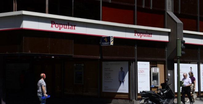 Una oficina del Banco Popular en el centro de Madrid, en una foto del 7 de junio de 2017, el día que se anunció la resolución de la entidad. AFP/Pierre-Philliope Marcou