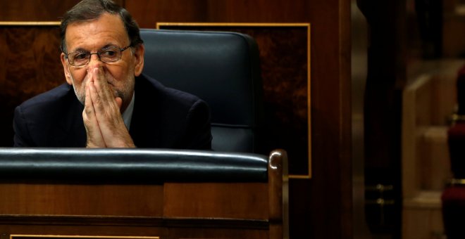Mariano Rajoy en su escaño. - REUTERS