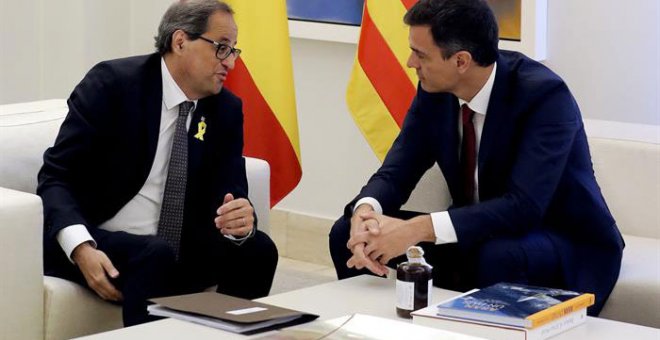 El presidente del gobierno Pedro Sánchez y el president de la Generalitat Quim Torra, durante la reunión de este lunes. /EFE