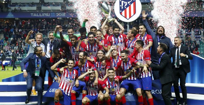 Los jugadores del Atlético de Madrid celebran su victoria ante el Real Madrid. - REUTERS
