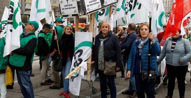 Participantes en la manifestación celebrada en Madrid por funcionarios de justicia. / EFE