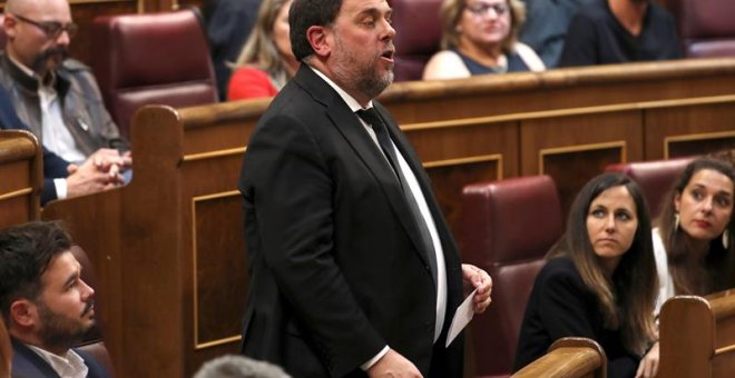 21/5/2019.-El líder de ERC, Oriol Junqueras, que se encuentra en prisión provisional, promete el cargo durante la sesión constitutiva de las nuevas Cortes Generales de la XIII Legislativa que se celebra este martes en el Congreso de los Diputados.EFE/Guil