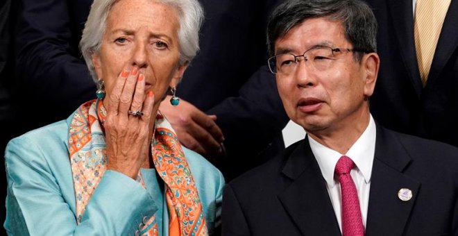 Christine Lagarde y Takehiko Naka, presidente del Banco Asiático de Desarrollo. EFE/EPA/FRANCK ROBICHON