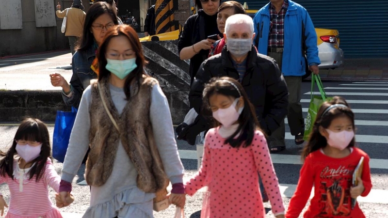 Personas con mascarillas en Taiwan | EFE