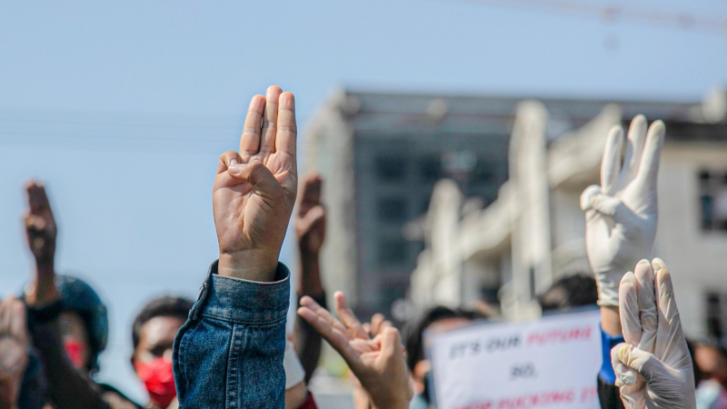 Protesters raise three finger salute during a demonstration against the military coup d'etat that deposed Myanmar State Counsellor of Myanmar Aung San Suu Kyi.