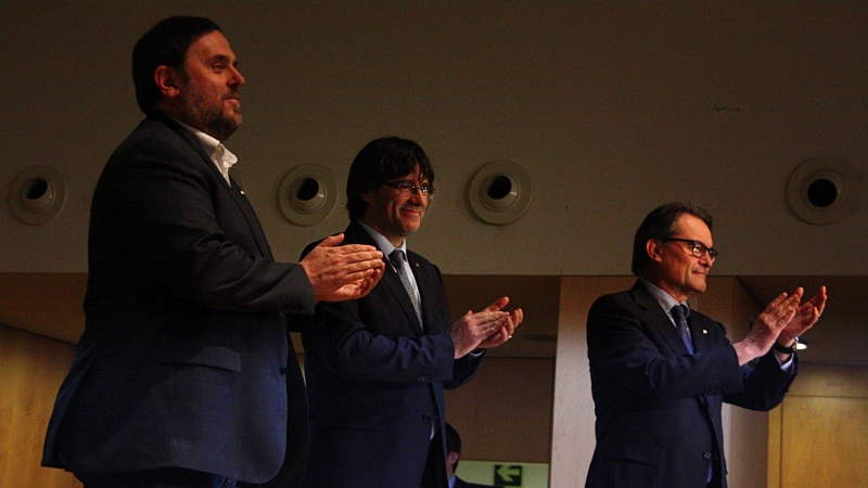 Junqueras, Puigdemont i Mas en una imatge d'arxiu, d'un acte del 2016.