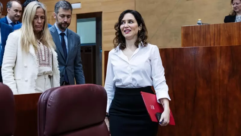 La presidenta de la Comunidad de Madrid, Isabel Díaz Ayuso, a su llegada a una sesión plenaria en la Asamblea de Madrid, a 14 de marzo de 2024, en Madrid (España).