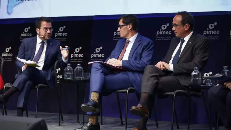 Los candidatos del PSC, Salvador Illa (c); ERC, Pere Aragonès (i) y de Junts, Josep Rull (d); durante un debate preelectoral organizado por la patronal PIMEC.