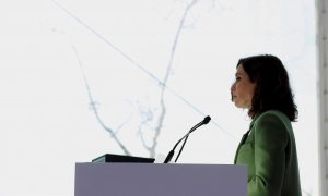 La presidenta de la Comunidad de Madrid, Isabel Díaz Ayuso, durante su intervención en la inauguracón de la mayor electrolinera de carga rápida en España para vehículos eléctricos, este martes en Pozuelo