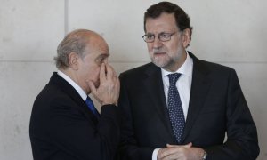 El expresidente del Gobierno Mariano Rajoy y el exministro del Interior Jorge Fernández Díaz en una imagen de archivo. EFE