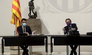 El presidente de la Generalitat, Pere Aragonès, junto al Conseller de Economía Jaume Giró (d) este martes 20 de julio de 2021.