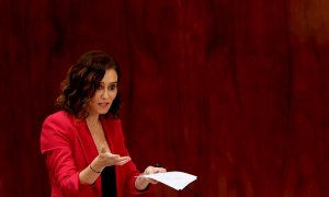La presidenta de la Comunidad de Madrid, Isabel Díaz Ayuso interviene durante el pleno de la Asamblea de la Comunidad de Madrid este jueves.