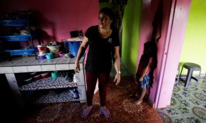María Bonilla, mujer productora de café en Honduras. Sus cuatro hijos que han migrado a EEUU.