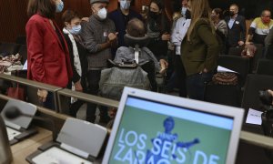 Familiares de los 'seis de Zaragoza' durante unas jornadas informativas en el Congreso de los Diputados, a 15 de diciembre de 2021.