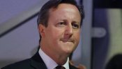 Cameron habla con Hollande y promete perros y vallas para frenar a los inmigrantes