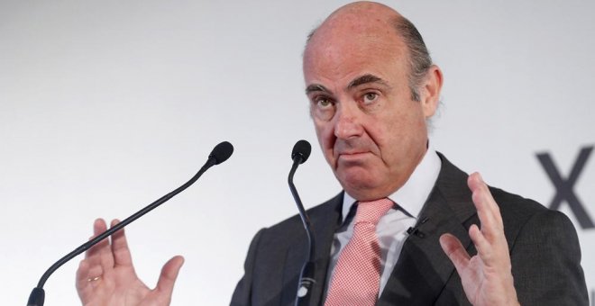 Guindos afirma que la fusión Bankia-BMN dará lugar a la entidad "más solvente" de España