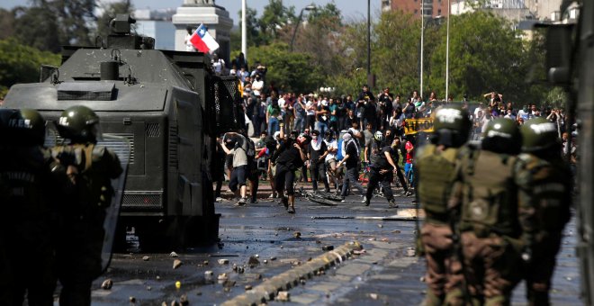 Las protestas en Chile se convierten en una "guerra" y dejan una decena de muertos