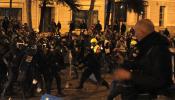 Absueltos los dos antidisturbios acusados de agredir a una periodista durante el 22-M